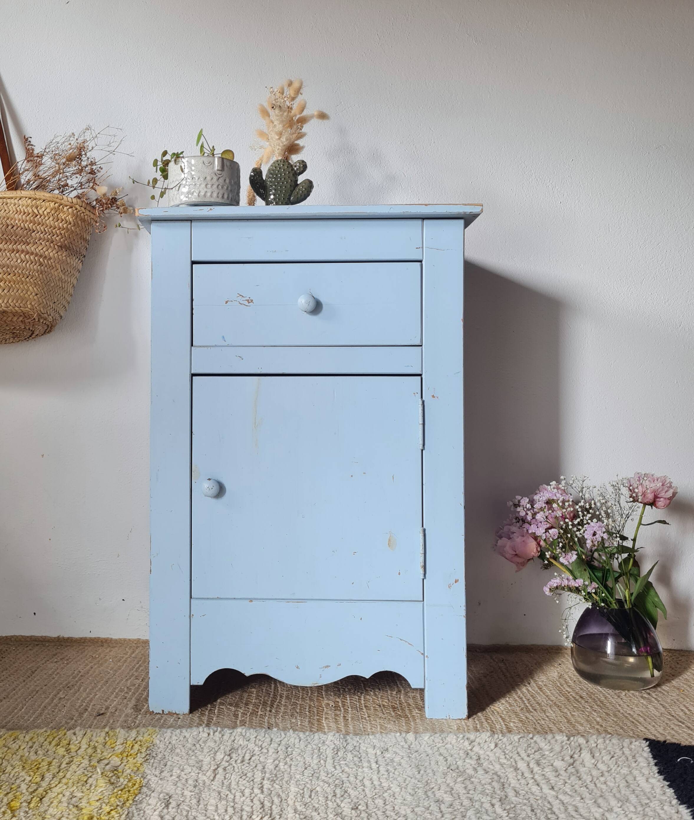 Handcrafted blue chest of drawers.