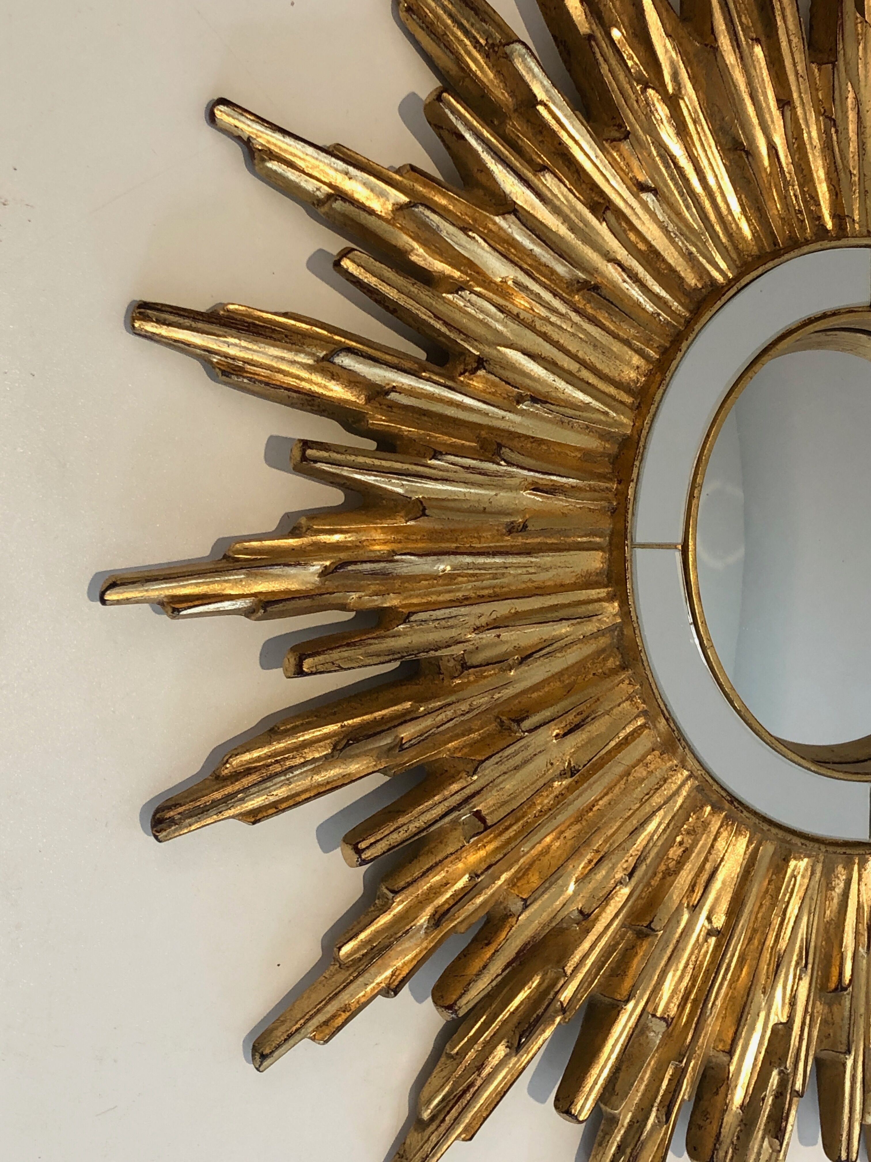 Sun mirror in golden resin 50cm