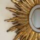 Sun mirror in golden resin 50cm