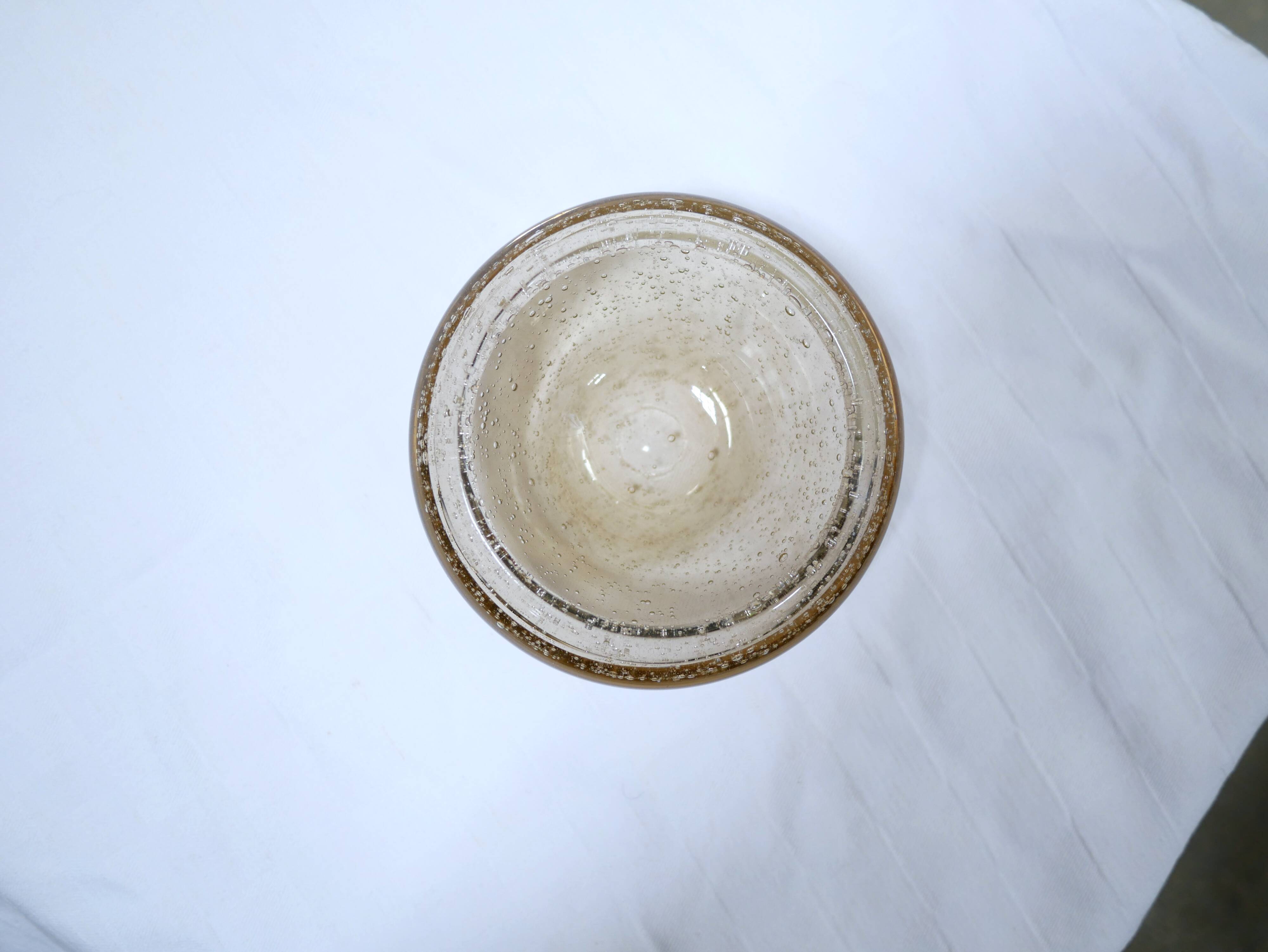 Empty vintage glass pocket blown by the glassworks of Biot