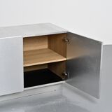 Pair of low buffets in brushed metal, French work, 1970s.