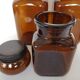 Set of 4 clear and brown glass jars