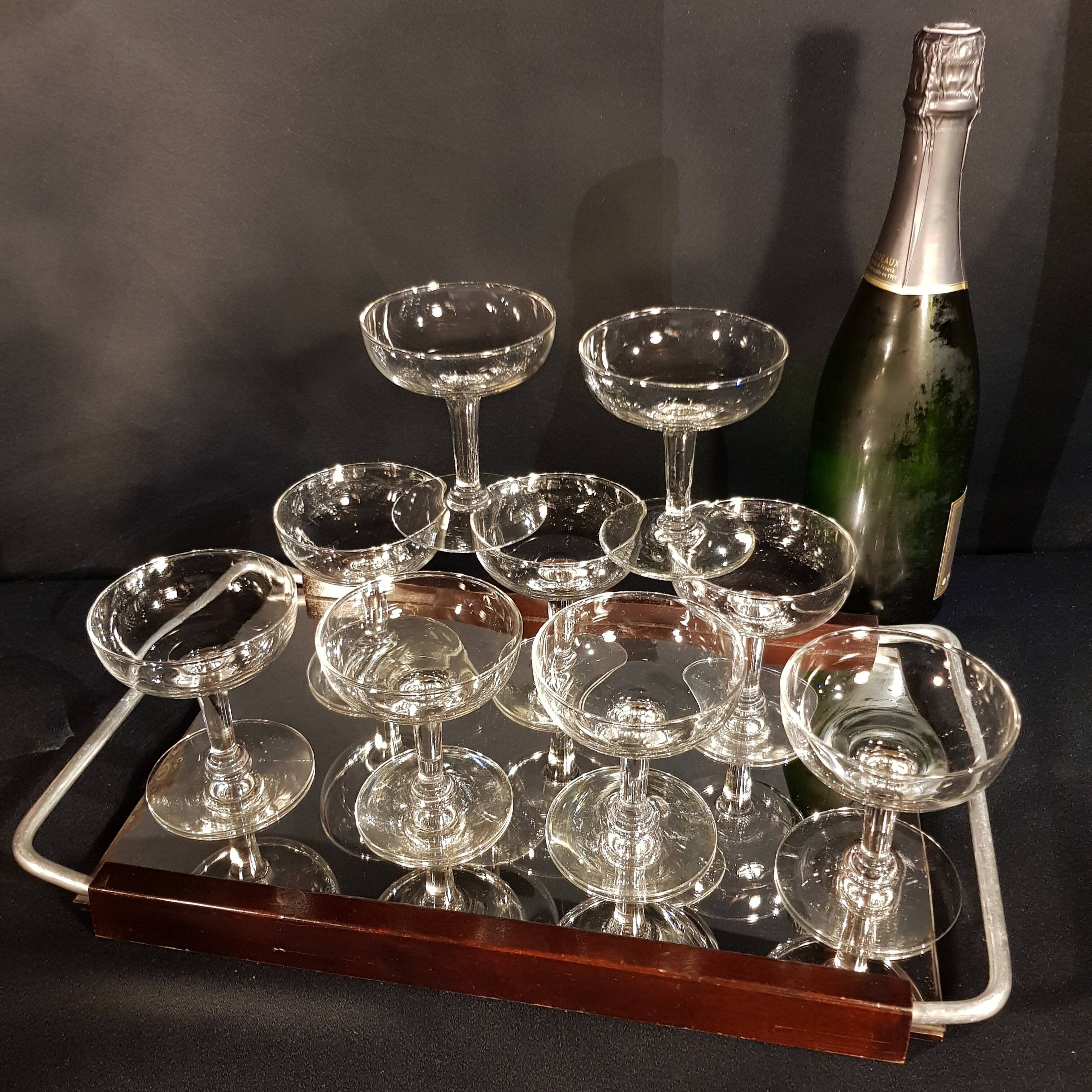 9 champagne glasses