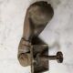 Antique cast iron door knocker in the shape of a 19th century hand