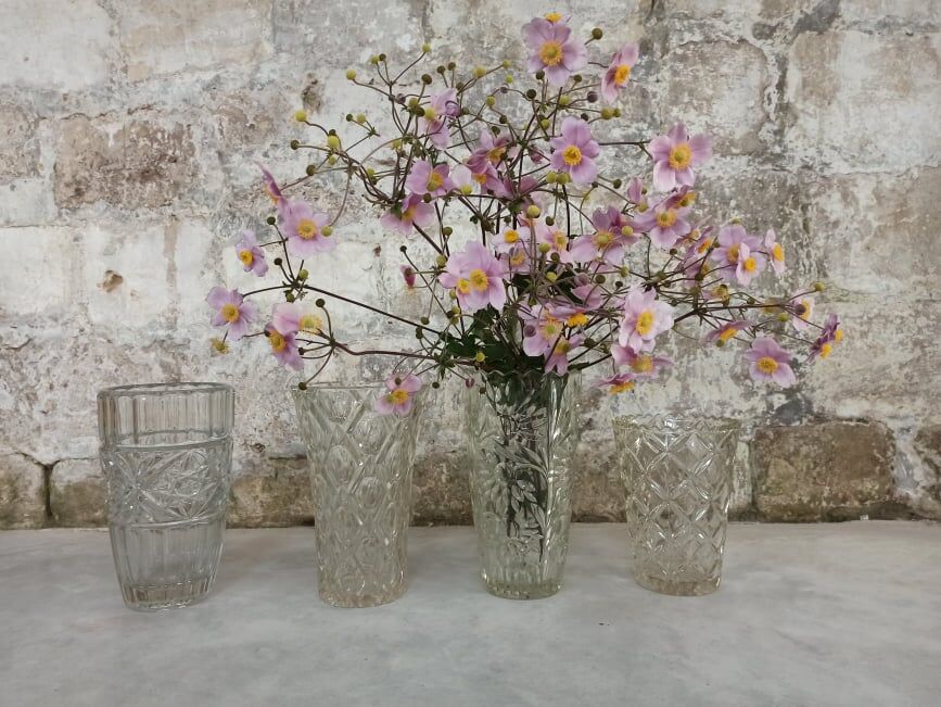 Four bohemian crystal vases