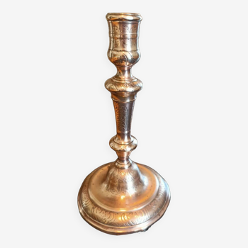 Chiseled candlestick in gilded bronze