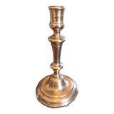 Chiseled candlestick in gilded bronze