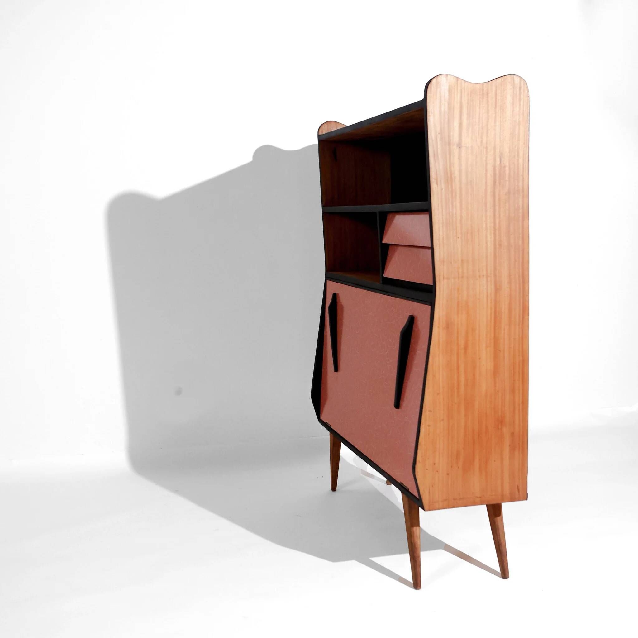 Vintage retro wooden storage furniture with salmon-coral accents and tapered legs, 1950s.