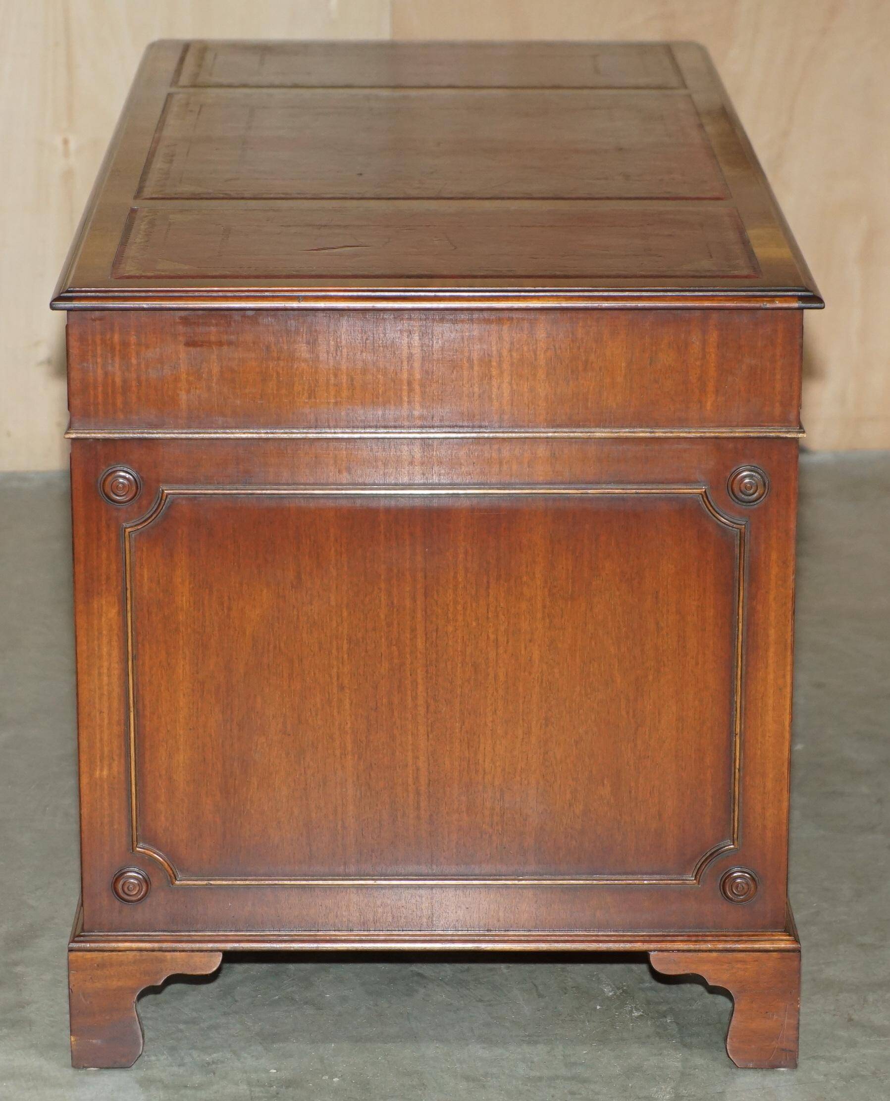 Partner desk Bevan Funnell in hardwood with leather top and gold leaf gilding.