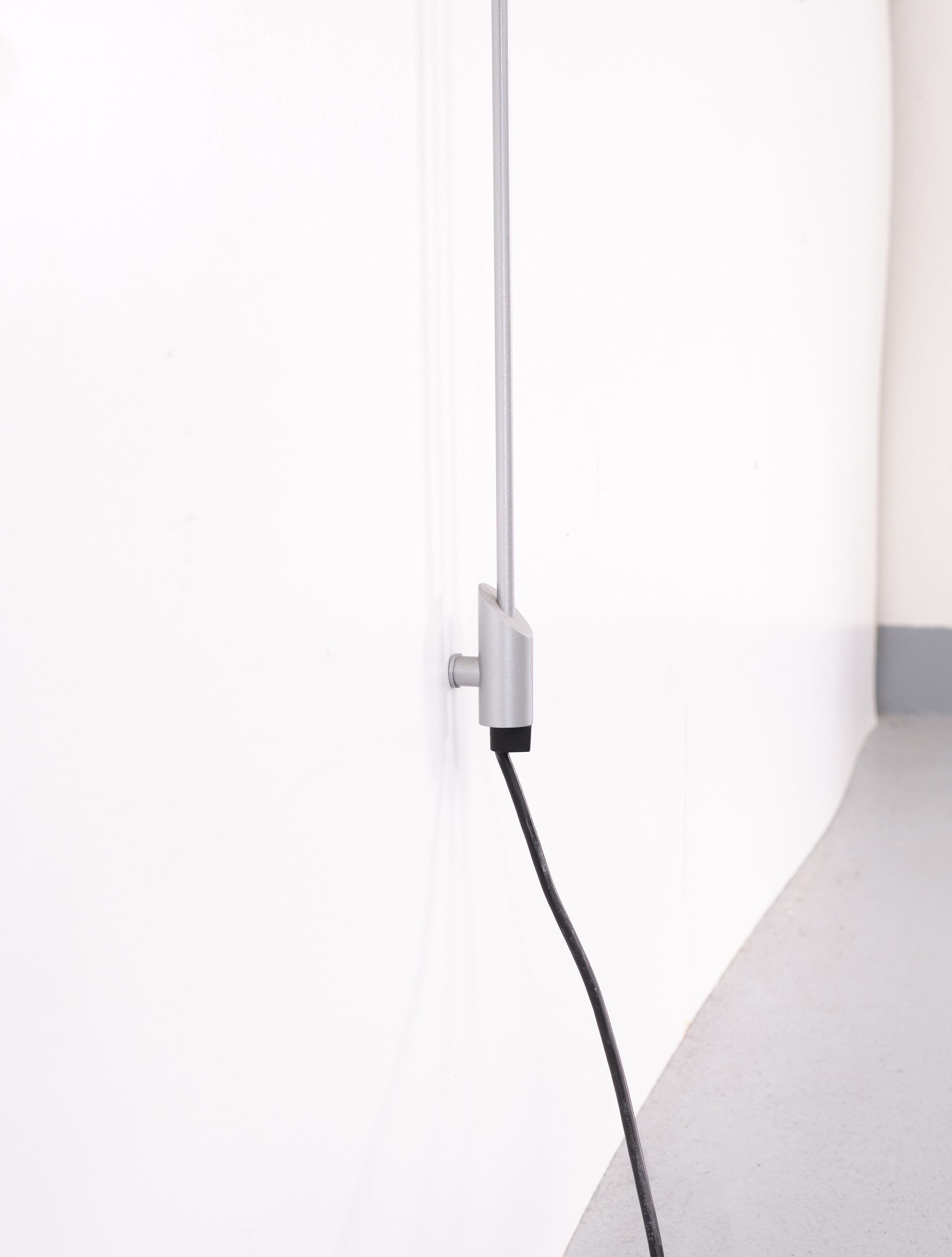 Sleek tall Halogen Wall lamp Occhio Italy