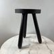 Tripod stool in turned, patinated wood
