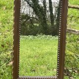 Rustic mirror called brutalist, molded carved natural wood
