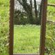 Rustic mirror called brutalist, molded carved natural wood