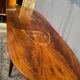 Louis XVI style oval dining table with rosewood marquetry extension mounted in bronze