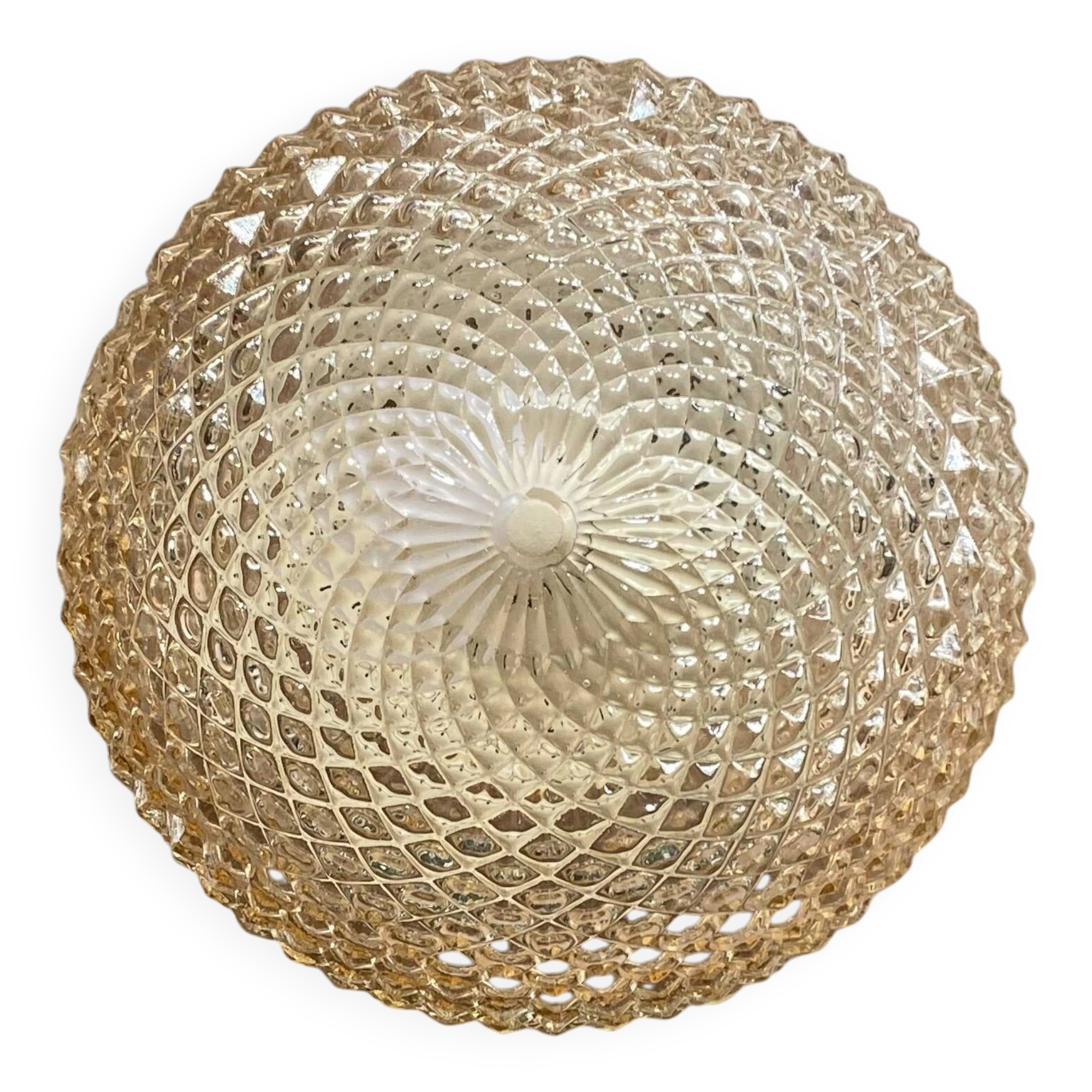 Amber glass wall light or ceiling light with a diamond tip.