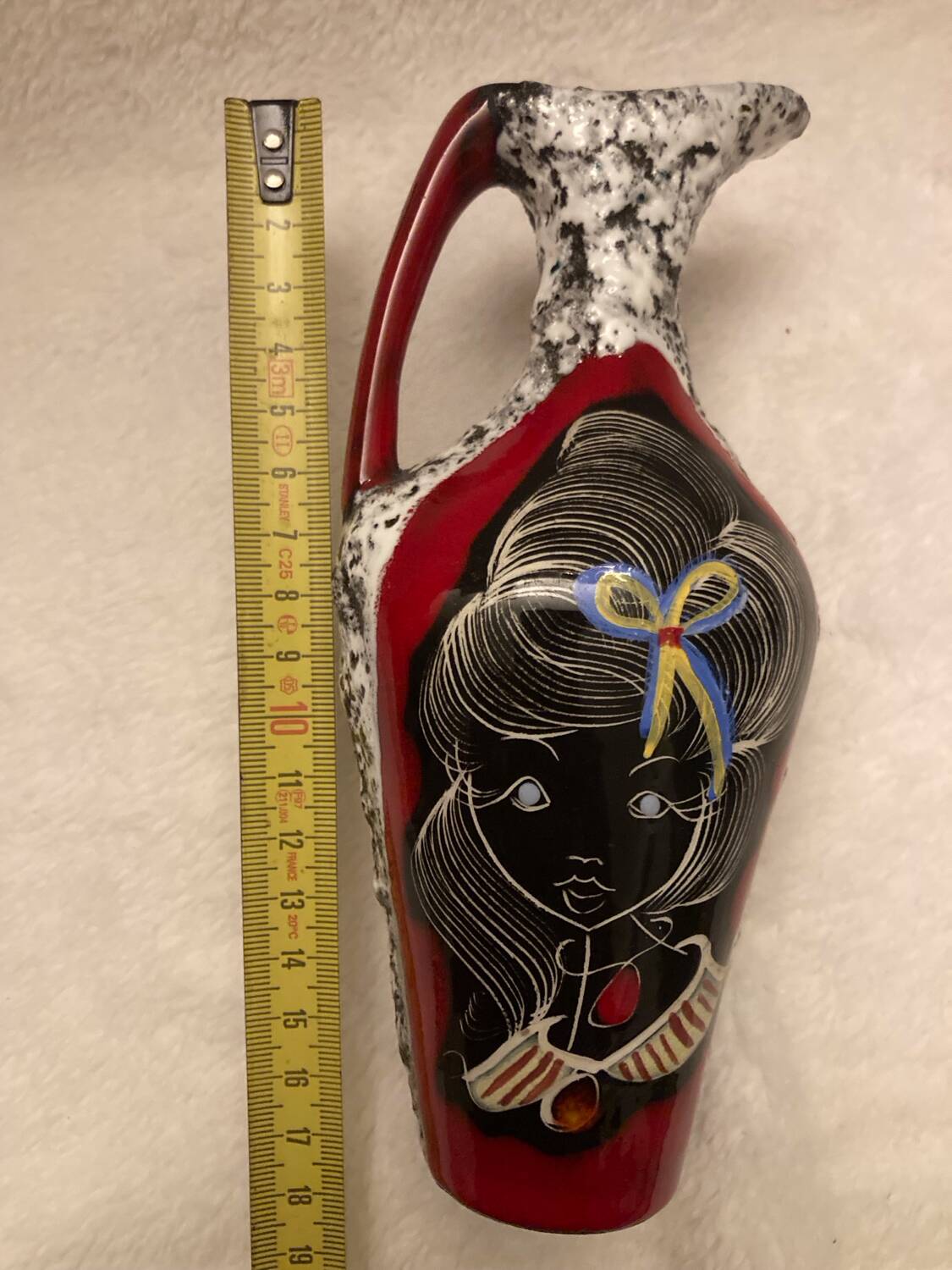 Vintage vase, made of glazed lava stone.