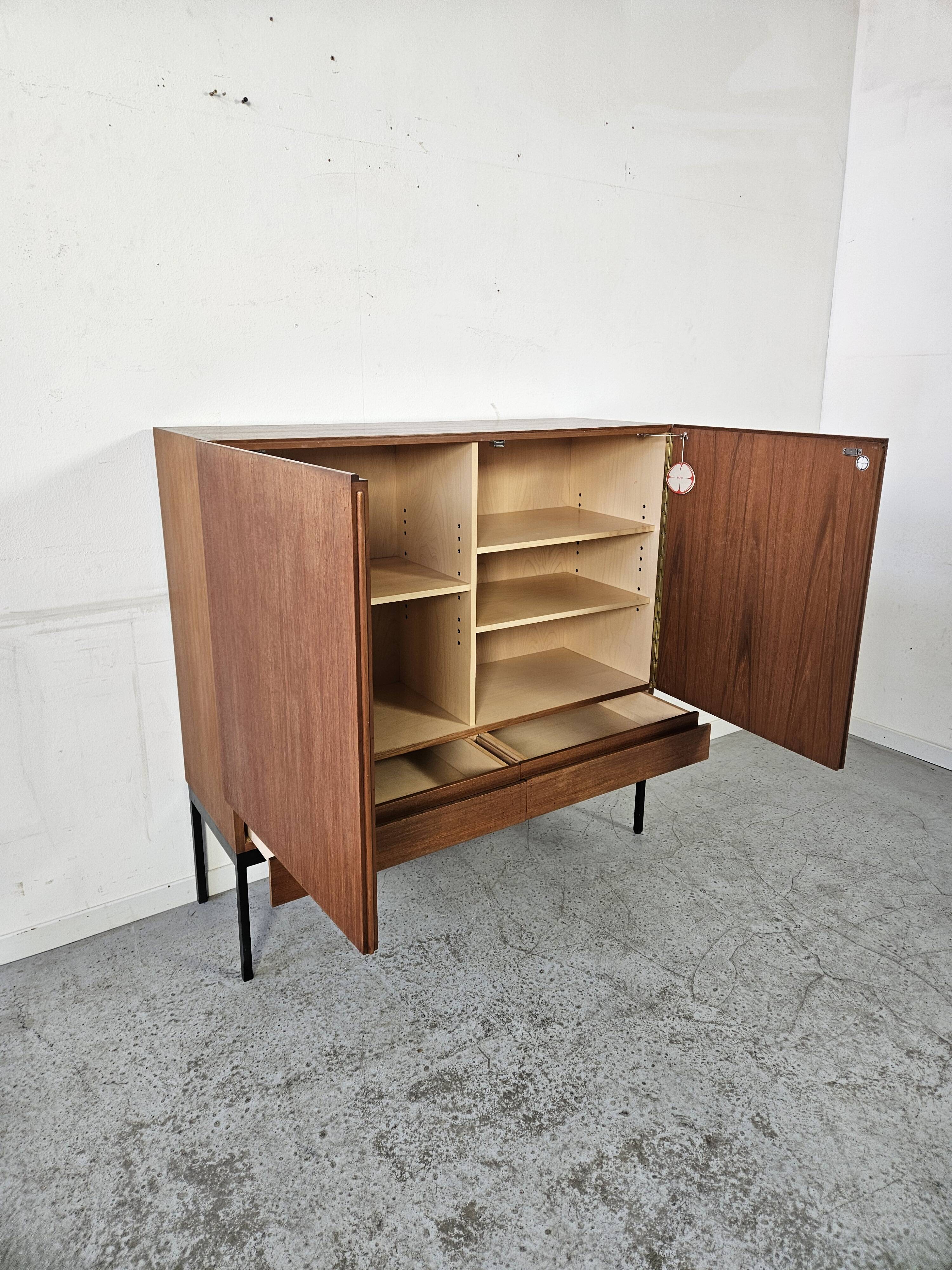 S21 highboard by Dieter Waeckerlin in teak, 1960s.