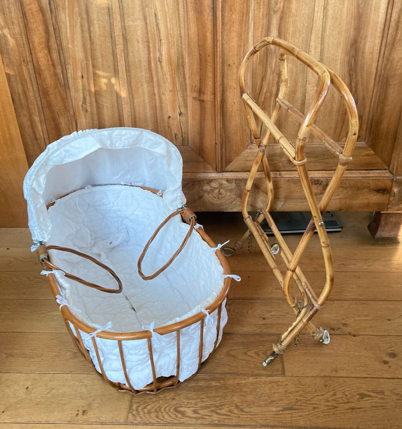 Bamboo, rattan, wicker cradle bassinet from the 1960s with a foldable support.