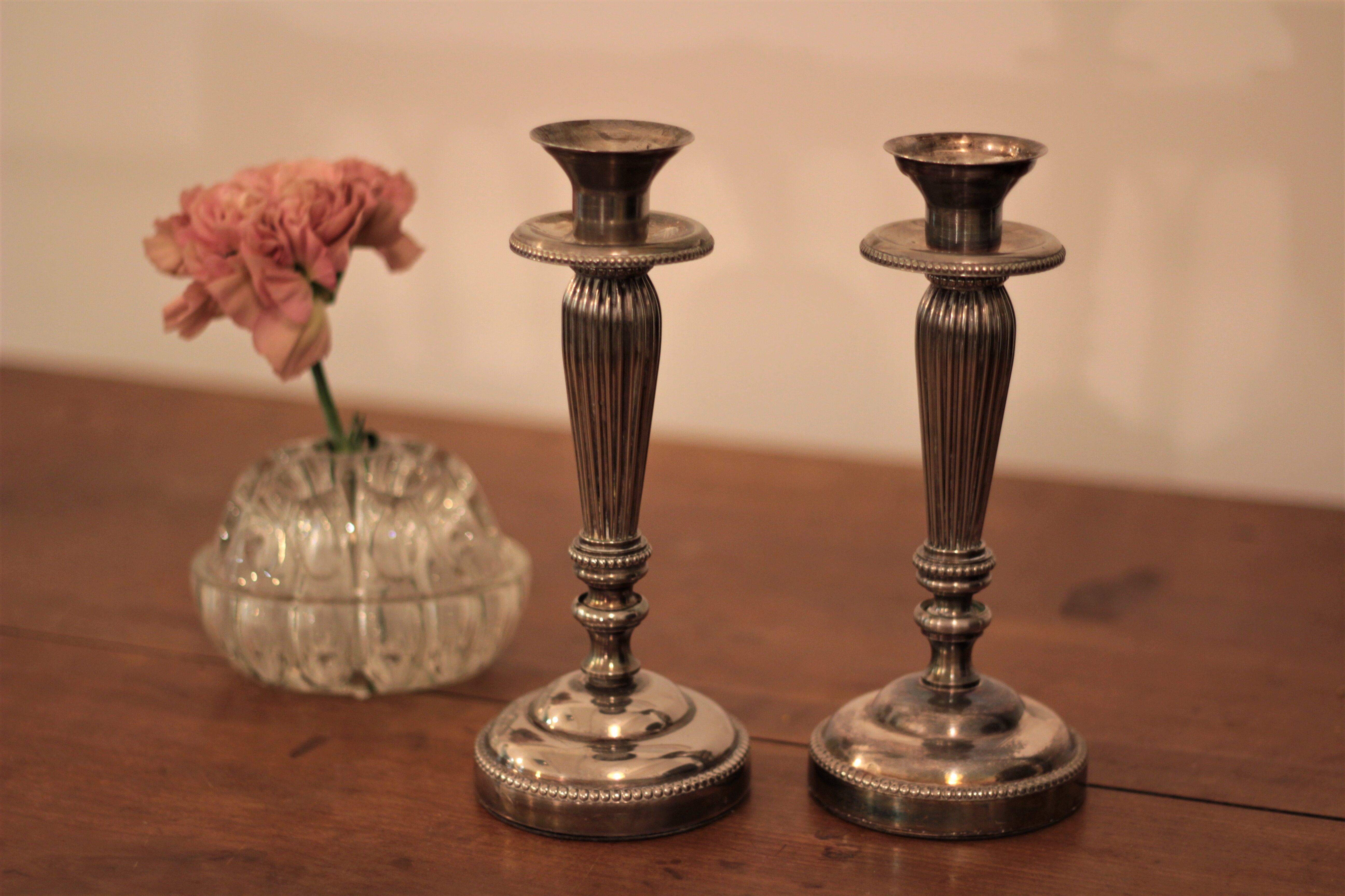 Pair of silver metal candlesticks