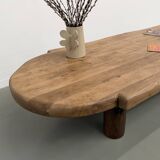 XXL oval coffee table in solid oak, cylindrical base, 1950s.