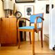 Bridge armchair in wood and blue skaï