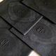 Set of four old damasked towels tinted black