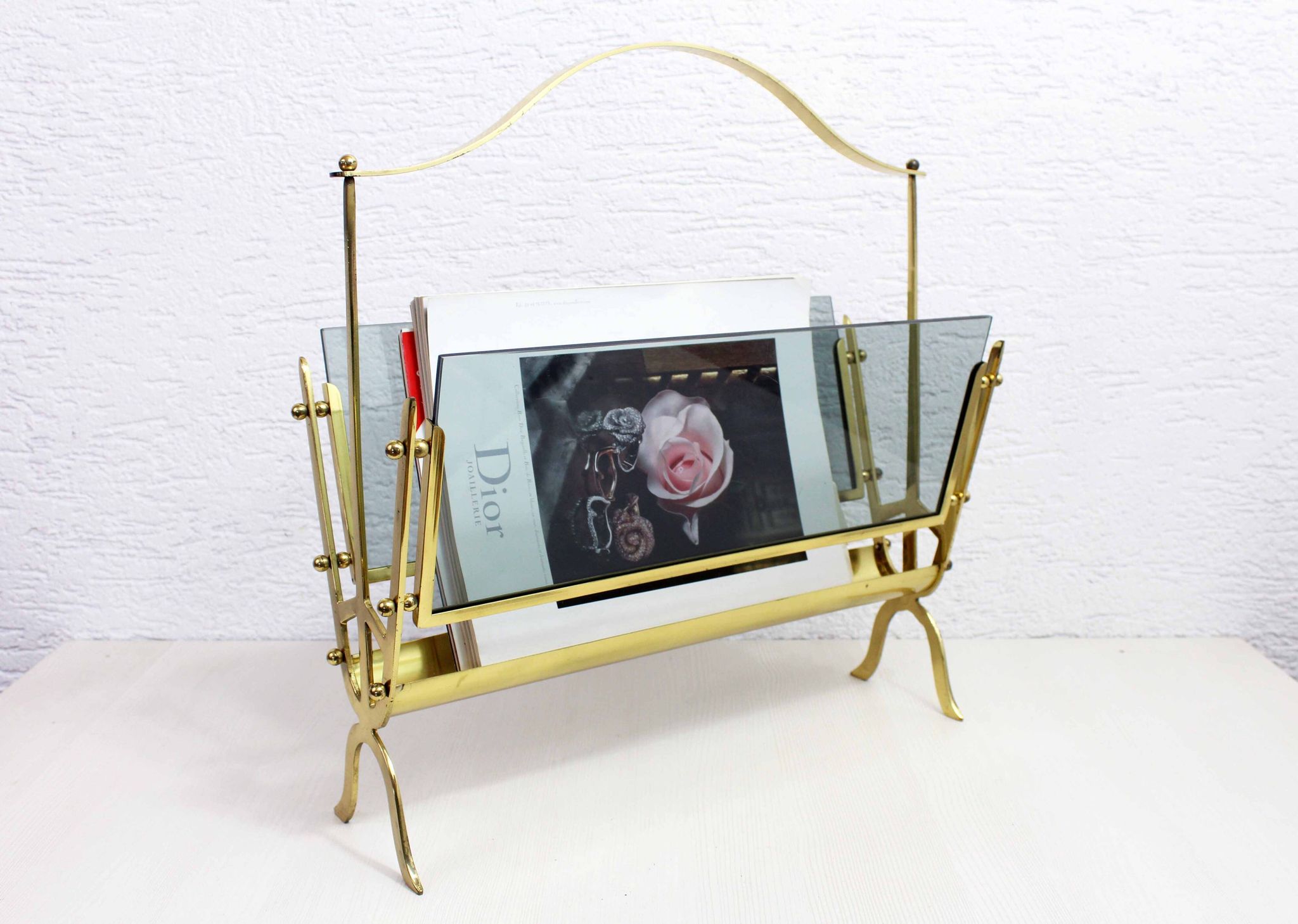 Glass and brass magazine rack, 1970s
