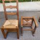 6 solid oak chairs with rush seats in a country style.