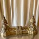 3 gilded bronze fireplace accessories 2 andirons and 1 fire bar
