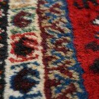 Good quality old oriental rug 100x73cm in red color