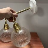 Pair of chiseled glass wall sconces