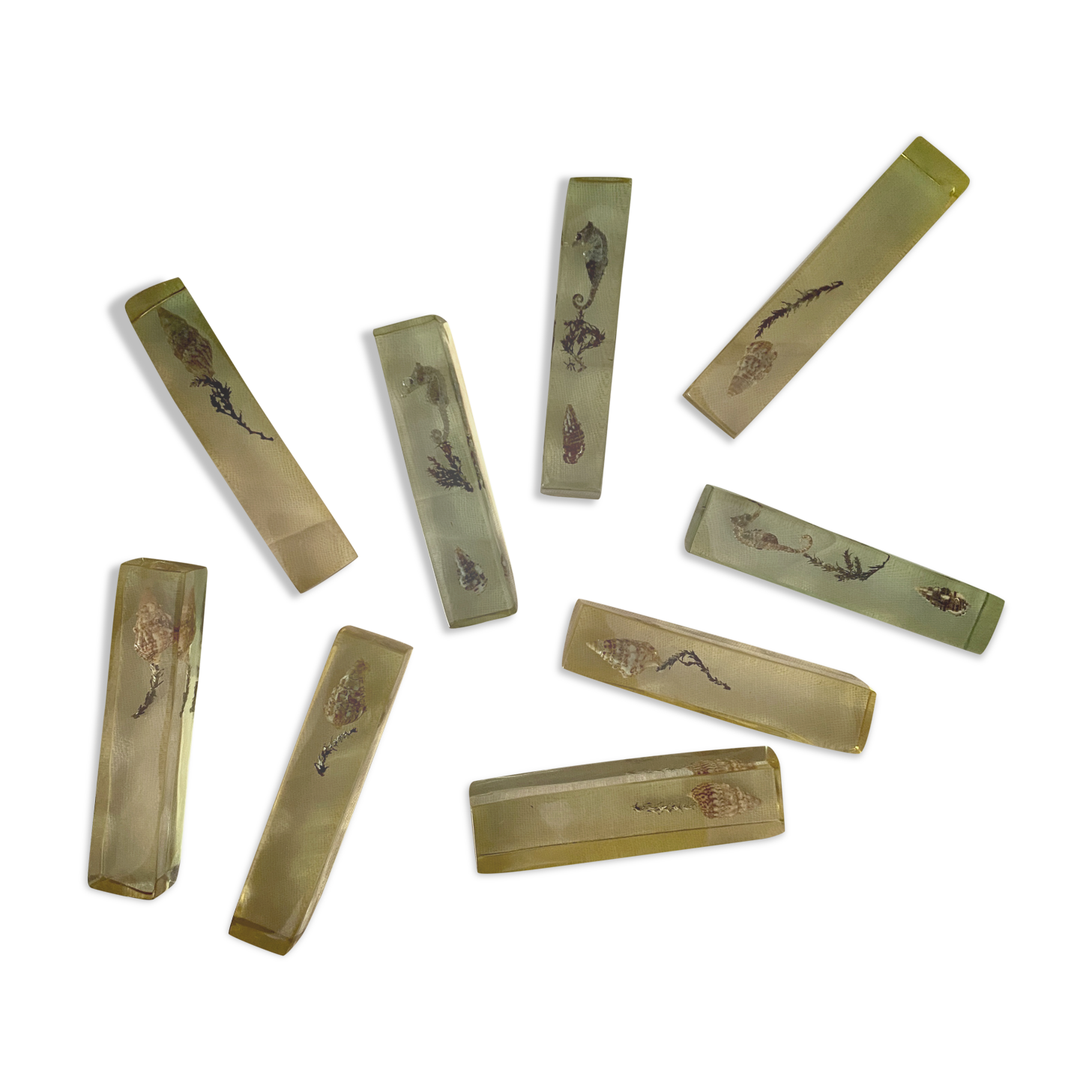 Set of 9 vintage resin knife holders including shell and seahorse