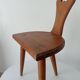 Low brutalist tripod chair in solid oak from the 1960s.