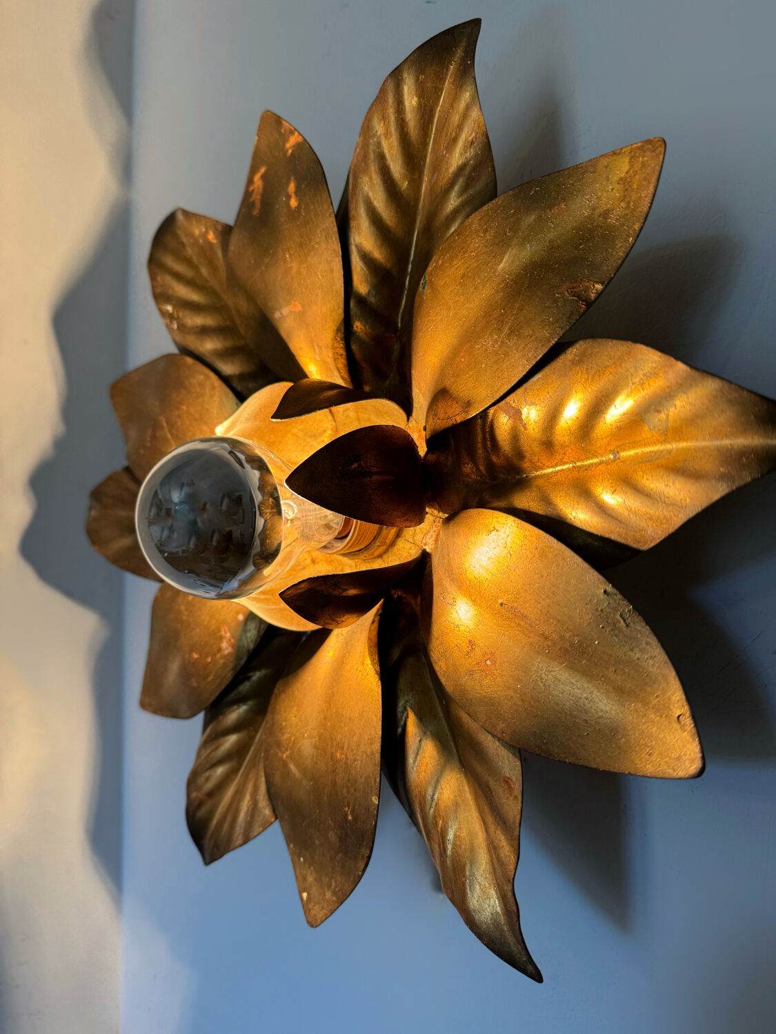 Golden flower wall light from the 70s