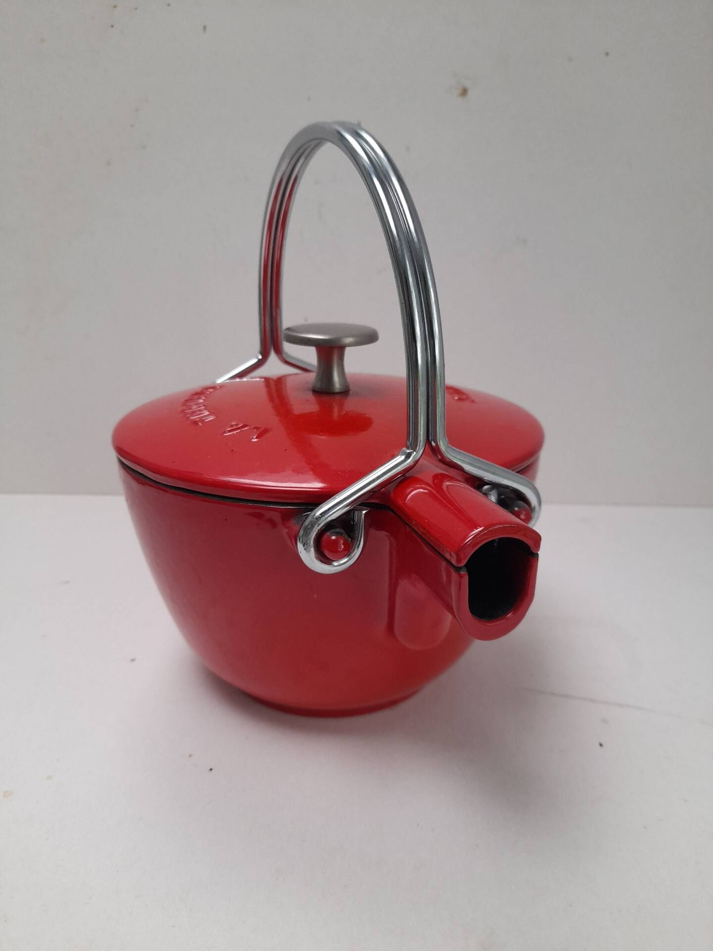 The Staub red enamelled cast iron teapot.