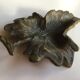 Empty pocket or ashtray leaf in old bronze