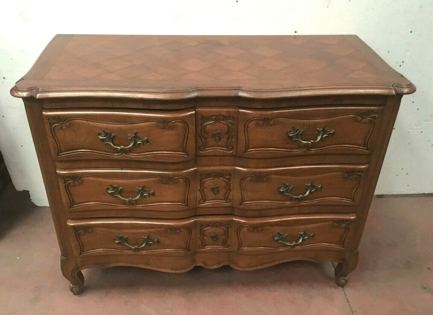 Three walnut drawers chest