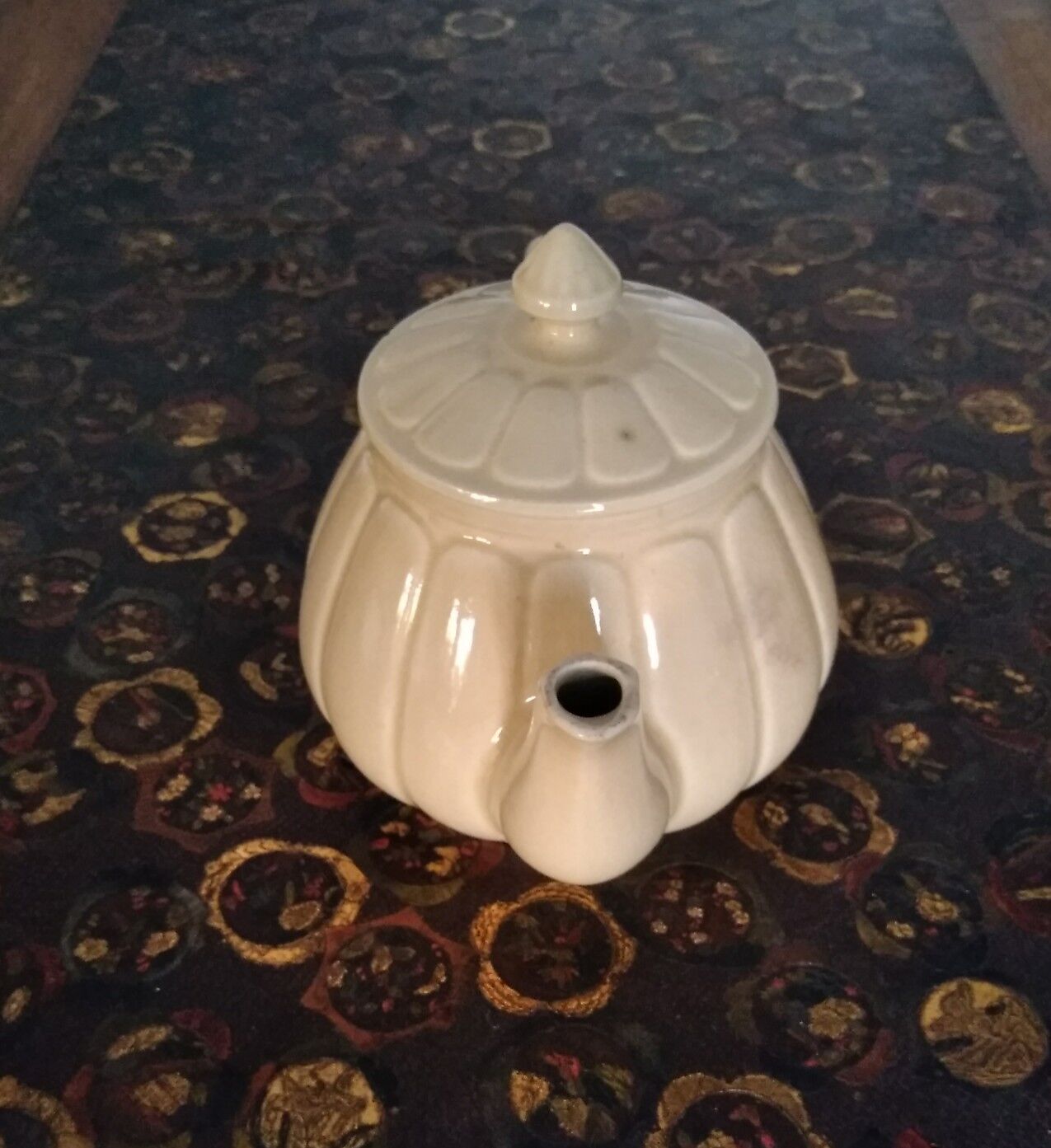 Cream-colored teapot