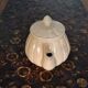 Cream-colored teapot