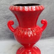Vase rouge en céramique avec des reflets noirs à deux anses