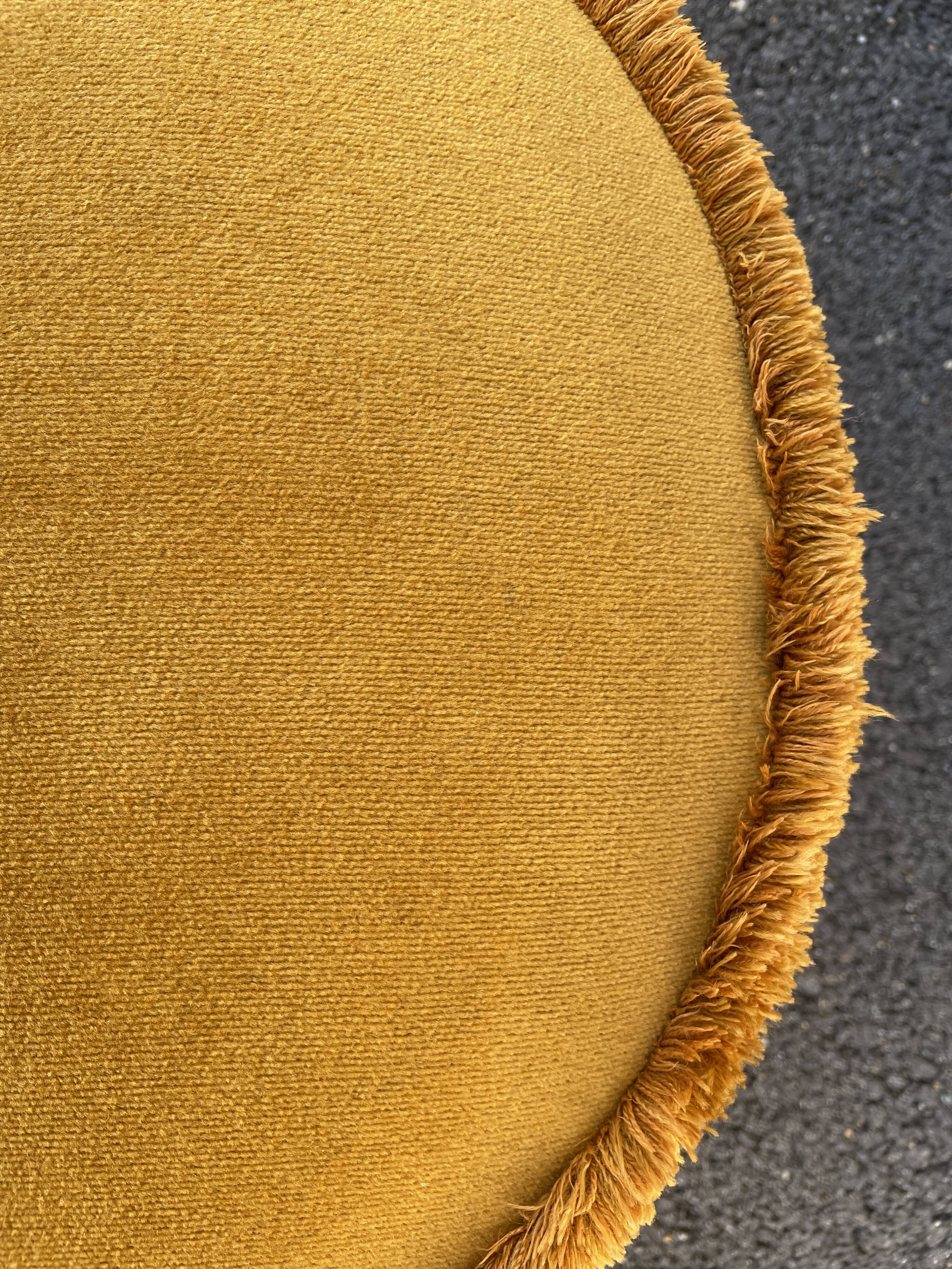 Golden yellow velvet pouf