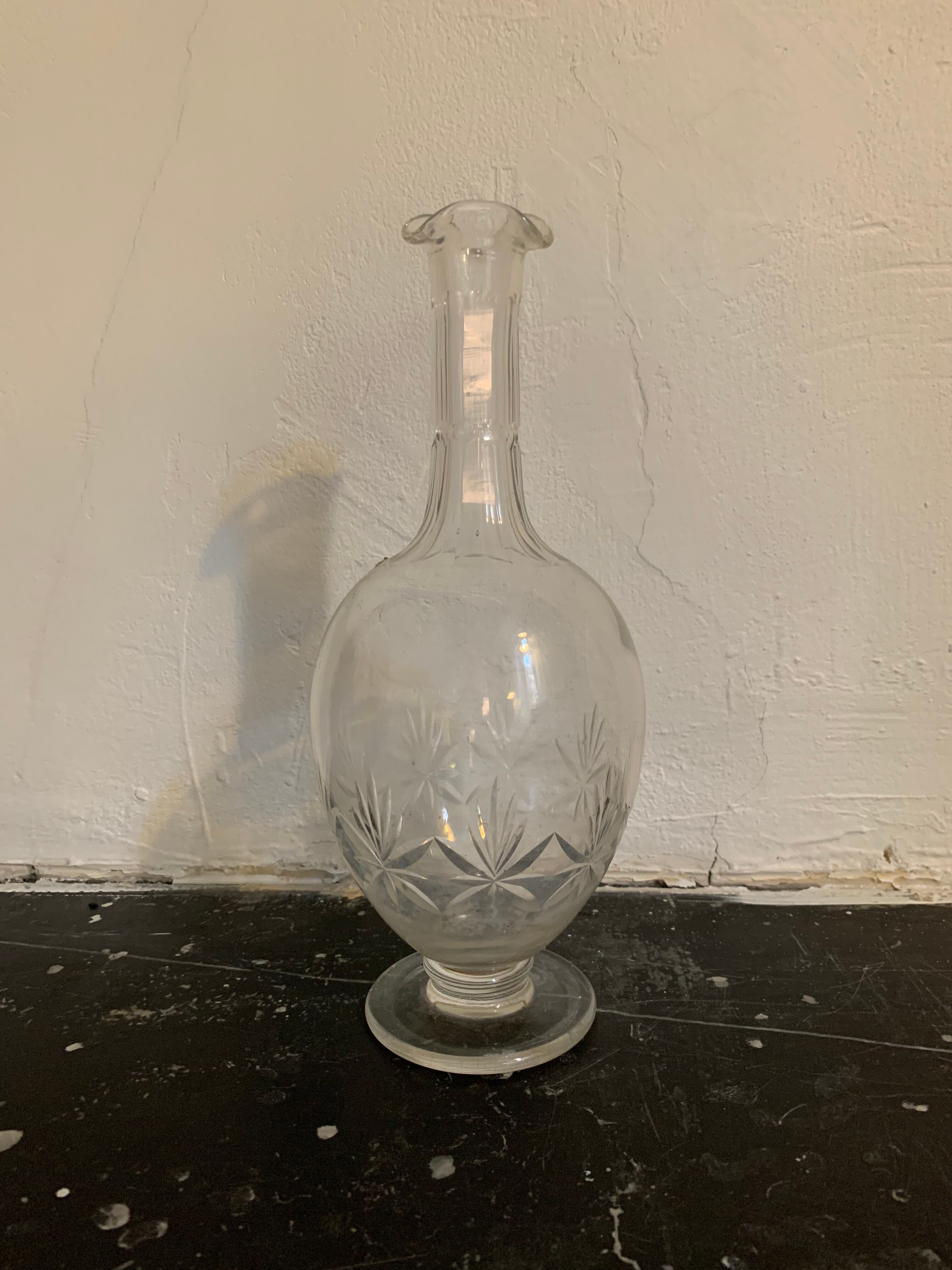 Old chiseled glass carafe