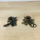 Pair of brass flower candlesticks, cellar