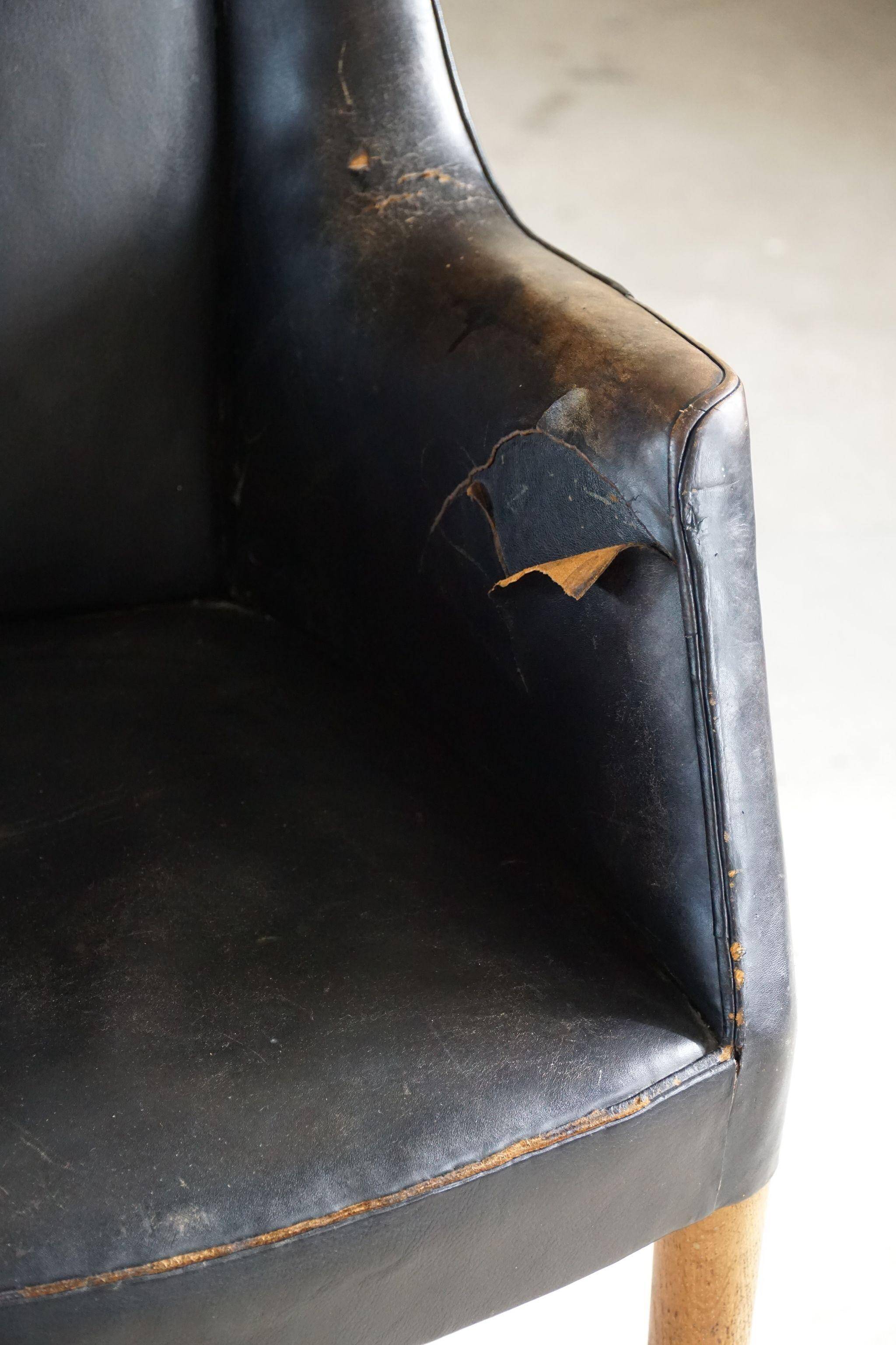 Fauteuil Danemark Moderne par Nanna Ditzel en chêne et cuir patiné, années 1950