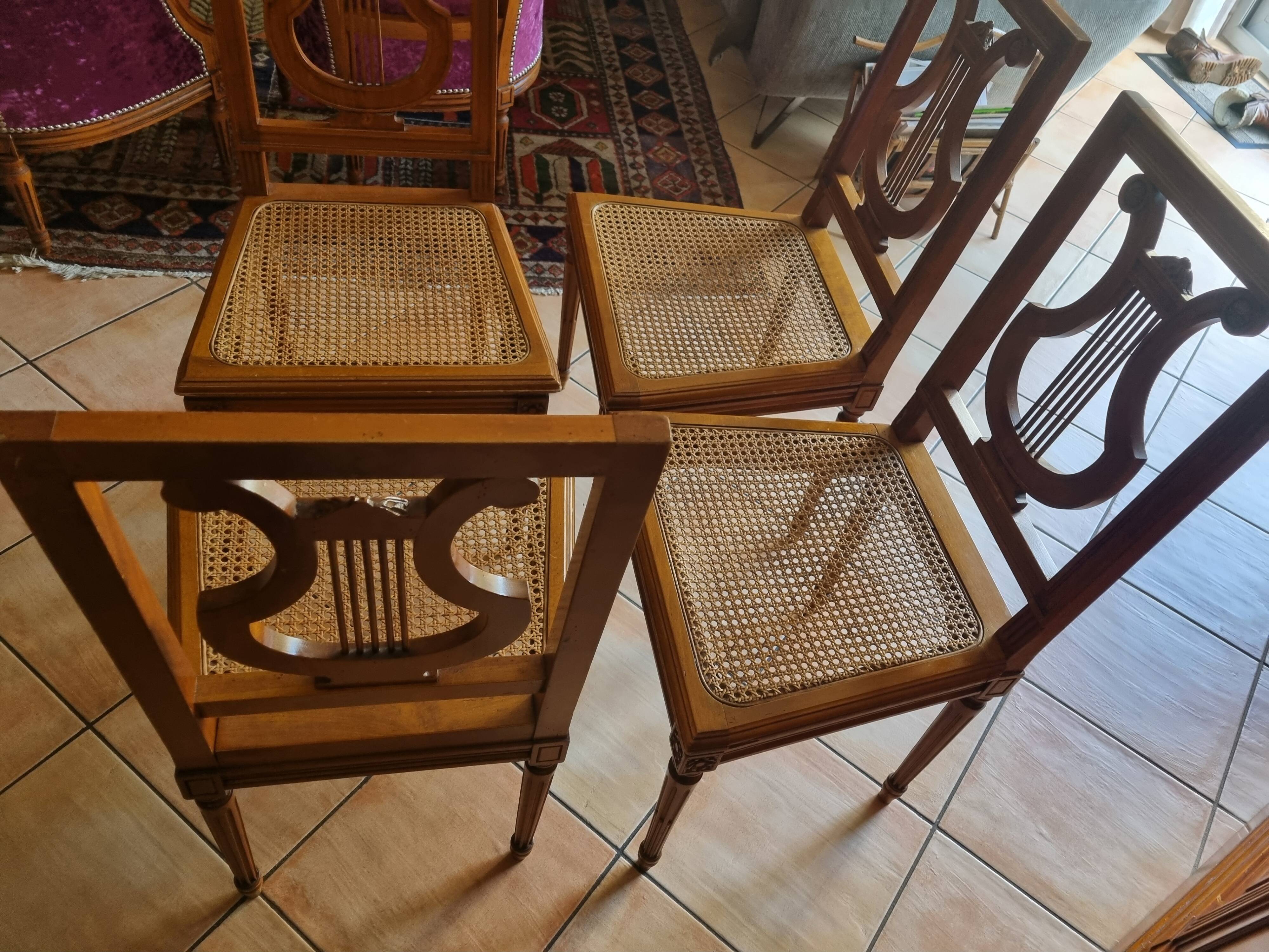 4 Louis XVI lyre chairs with caning