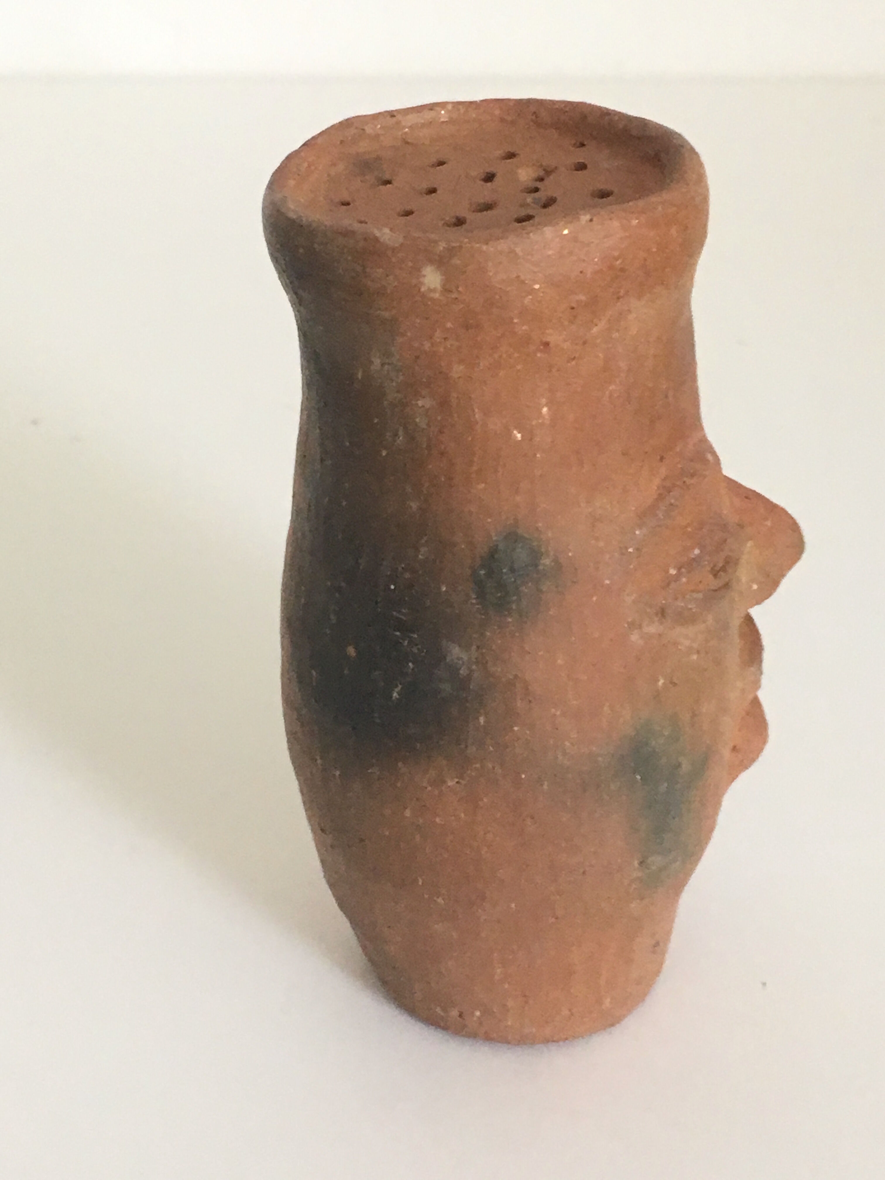 Artisanal terracotta terracotta salt shaker character head sculpture