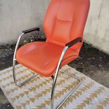Orange leather cantilever tubular armchair
