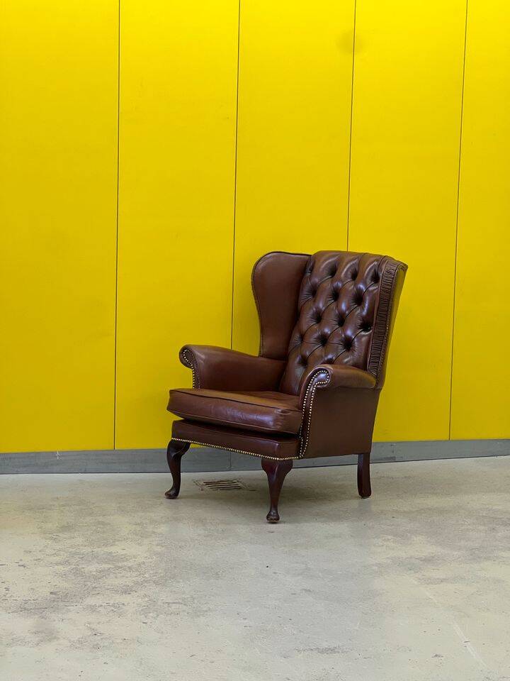 Fauteuil Chesterfield traditionnel anglais en cuir