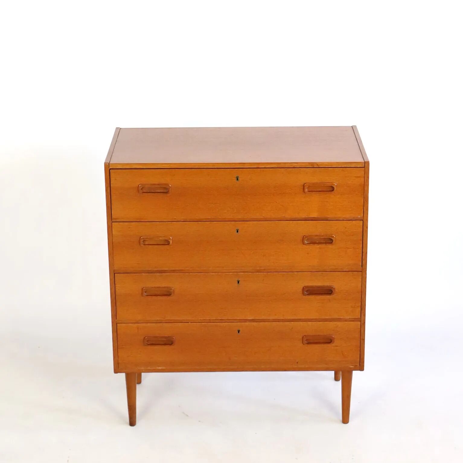 Teak chest of drawers with four drawers