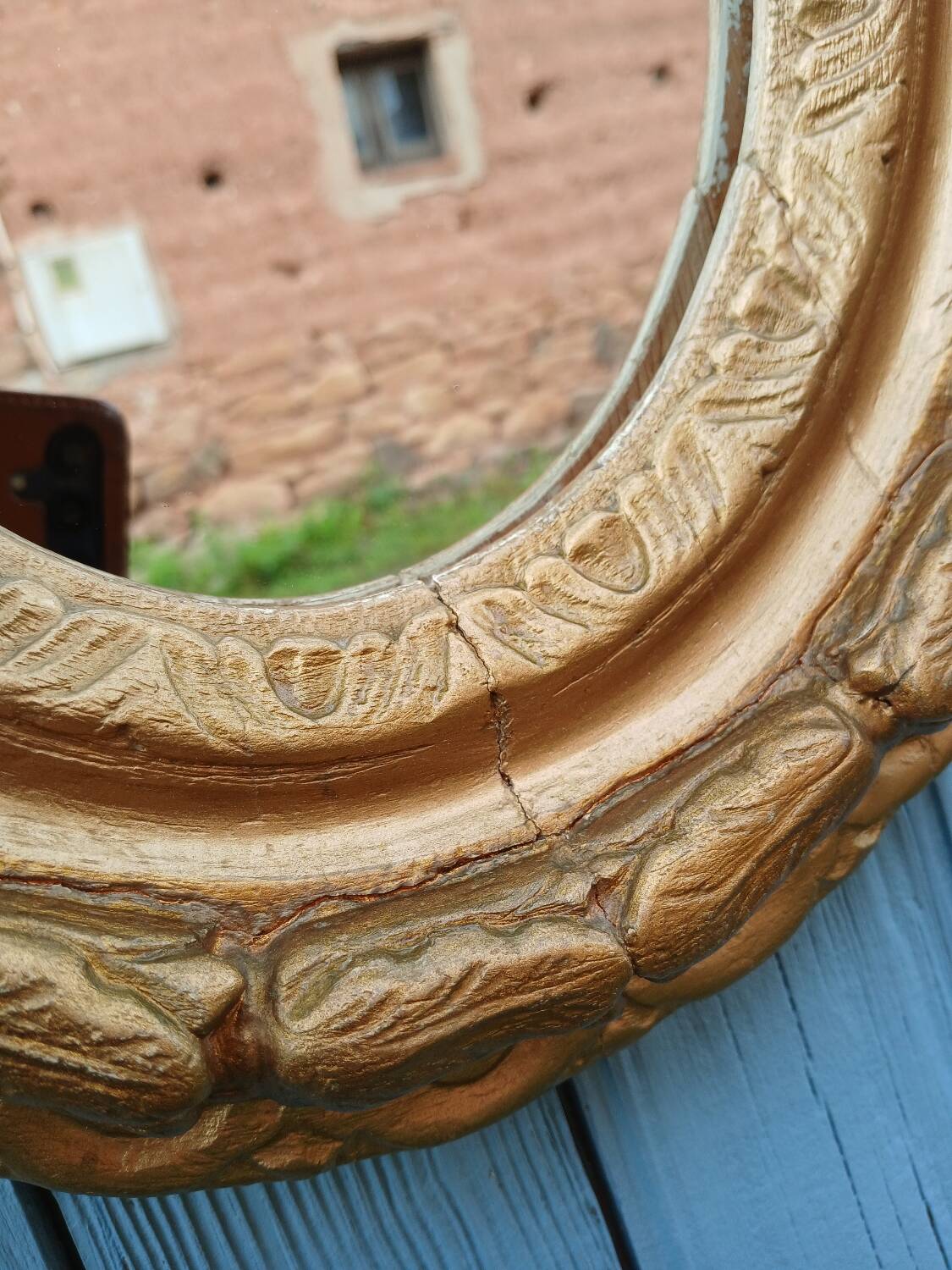 Miroir ancien en bois doré